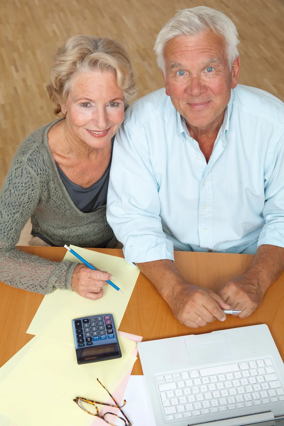 A mature couple reviewing their retirement finances together